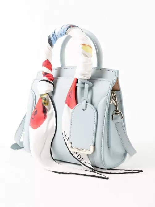 Light blue bag with short handles